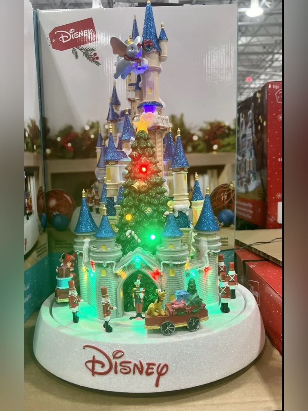 Disney animated castle with lights and music